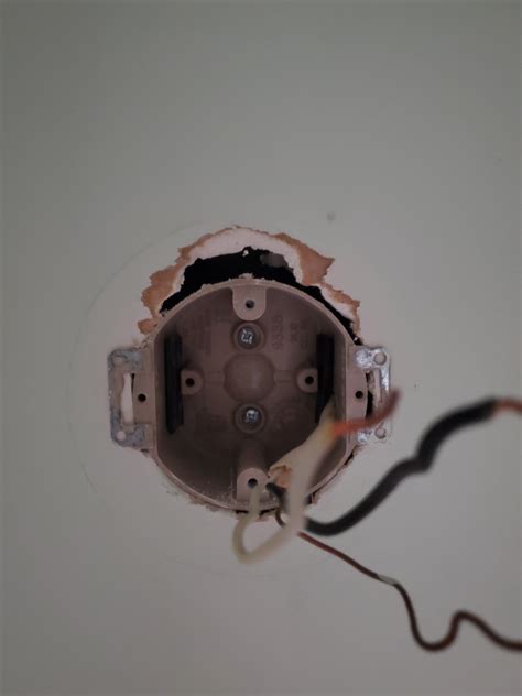 Light fixture mounting bracket doesn't fit electrical box